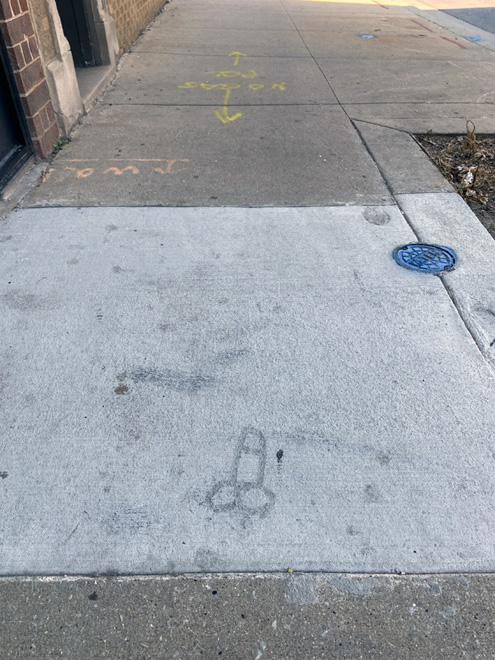 Cock and balls drawn on fresh concrete